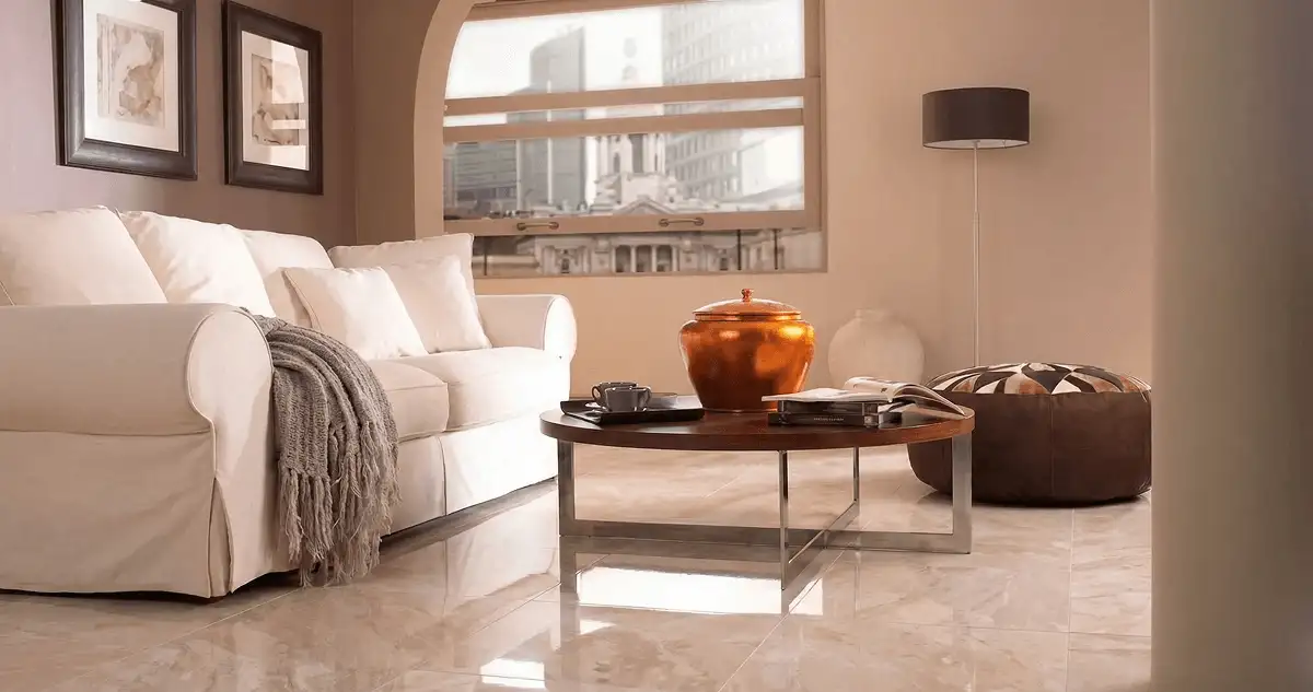 Modern living room with professionally installed marble flooring, a beige sofa, coffee table in Austin, TX