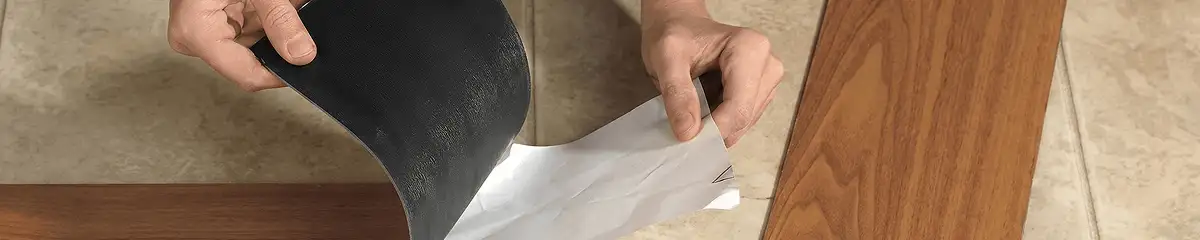 A professional installing vinyl flooring in Austin, TX